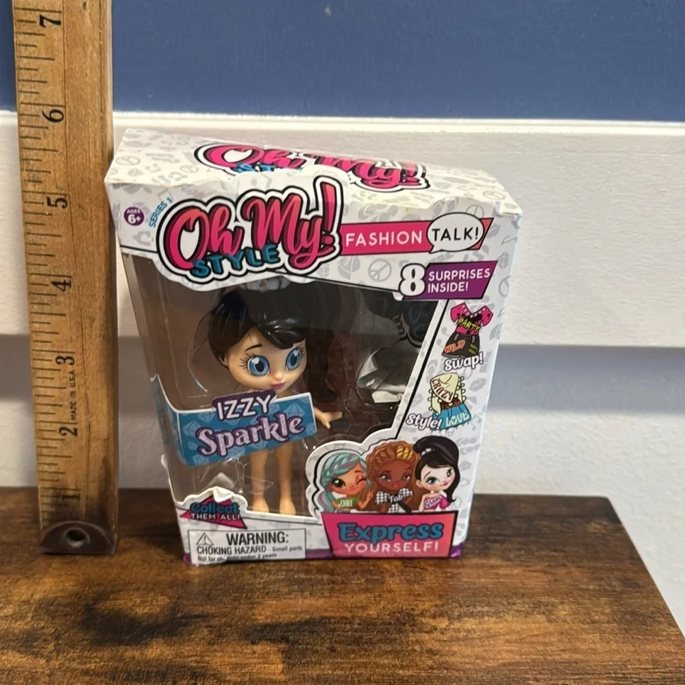 Oh My! Style doll - Izzy Sparkle - White with blue eyes brown hair - series 1